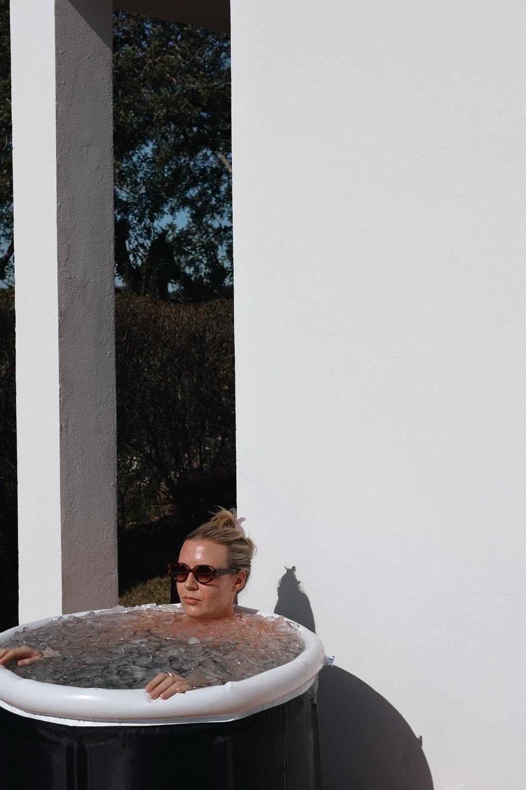 Amanda experiencing an ice bath at POMAR Coliving, Algarve, Portugal