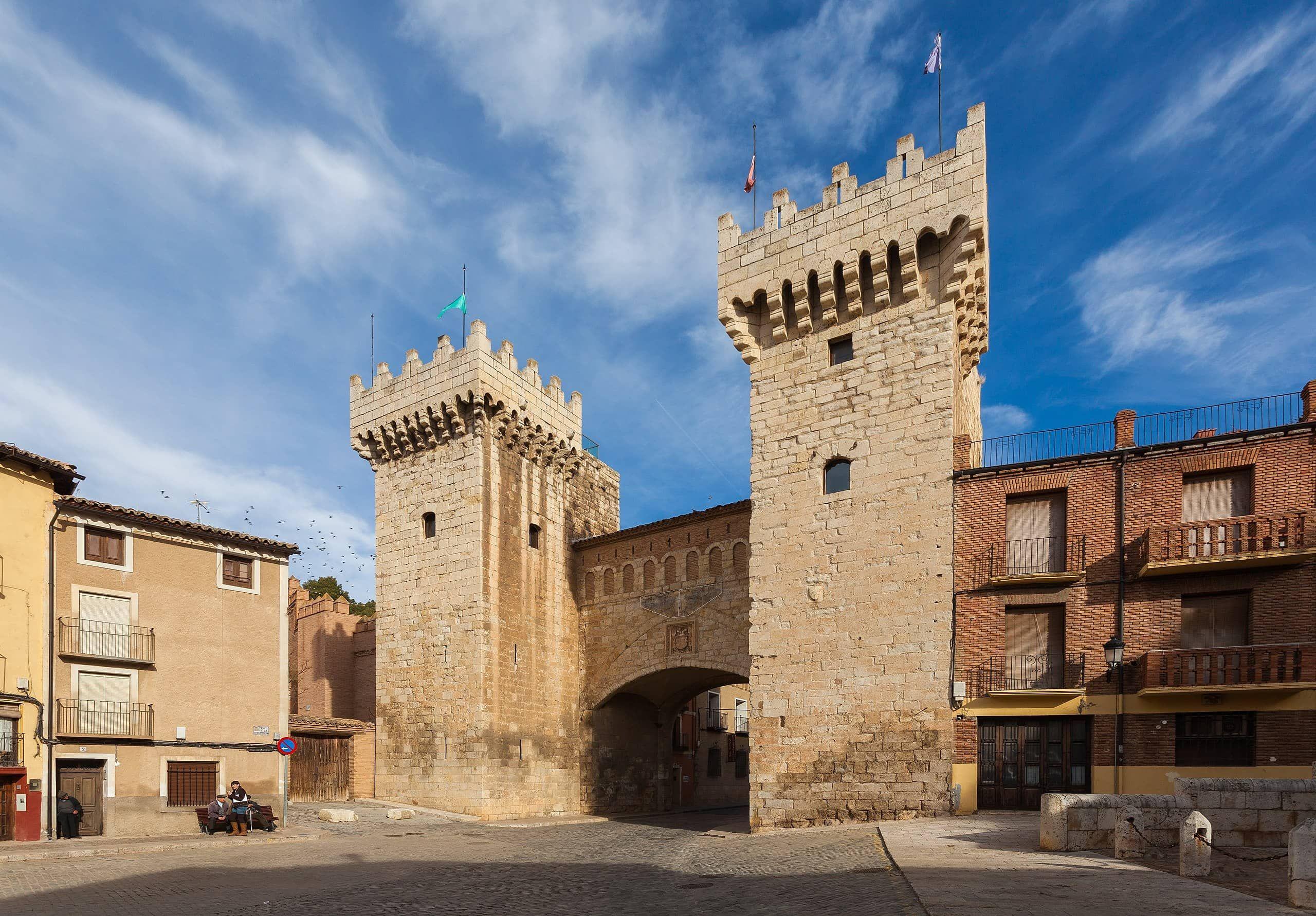 Arco de la Villa, ancient entrance gate to the city of Daroca under a blue sky
