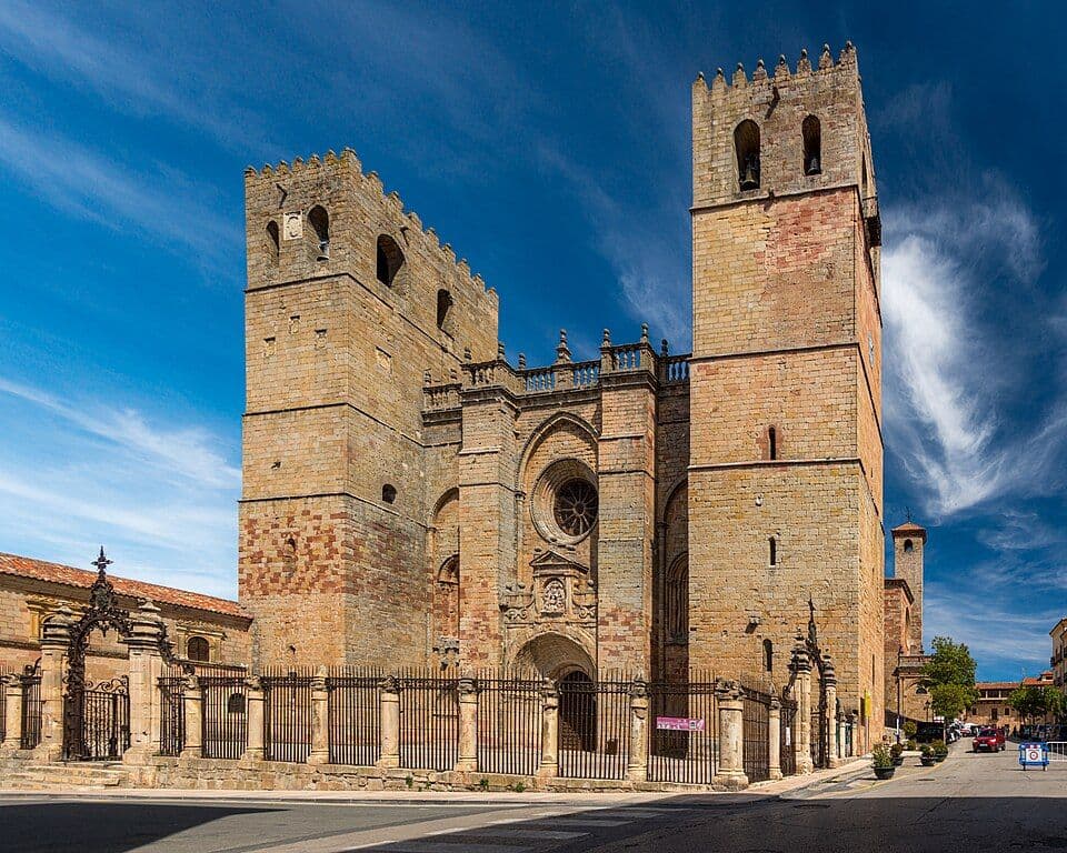 Cathedral in Sigüenza, Spain, with blue sky and architectural details
