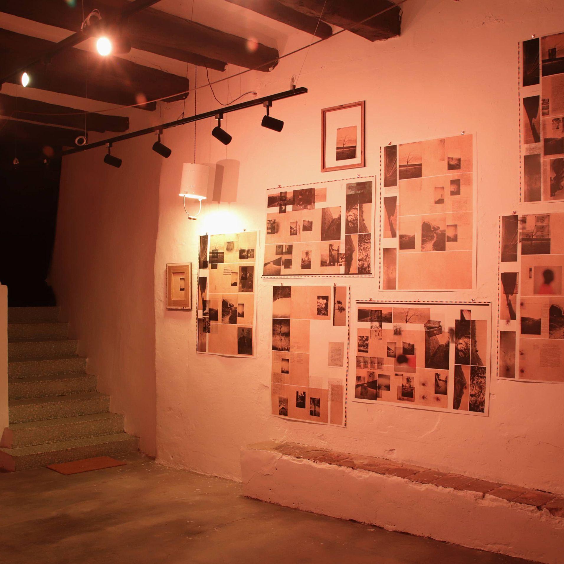 Art gallery with photos and stairs in the exhibition hall at Posada de la Luz