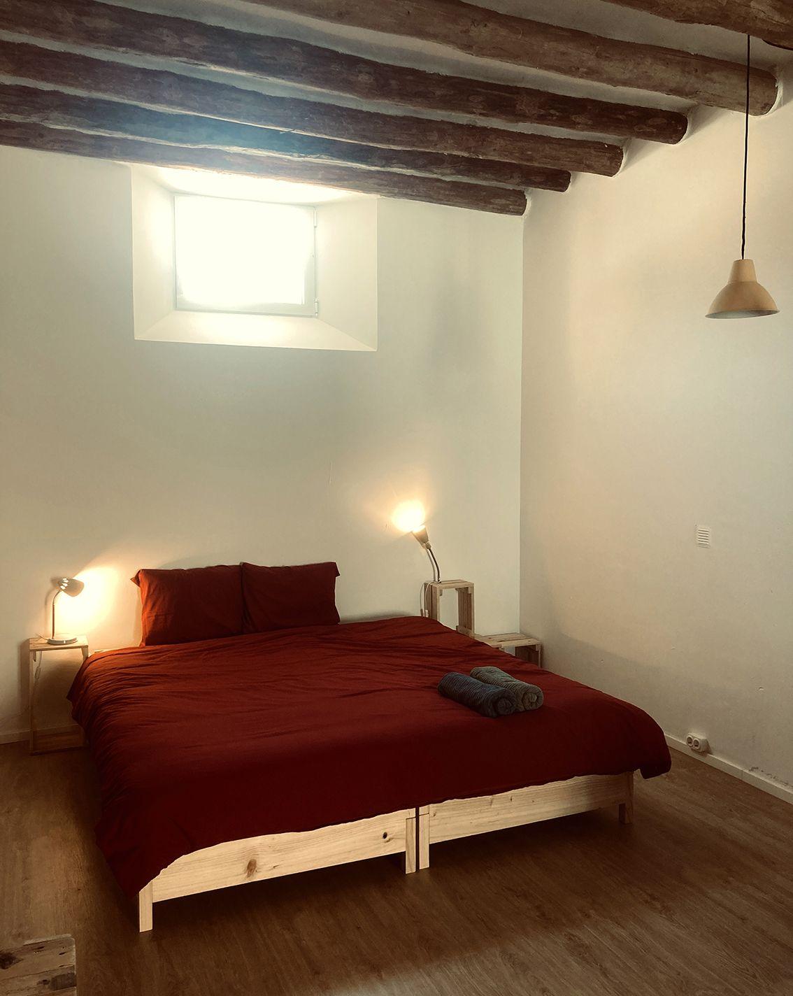 Bedroom in the single apartment El Molino for extended stay at POSADA DE LA LUZ, rural coliving in Aragon