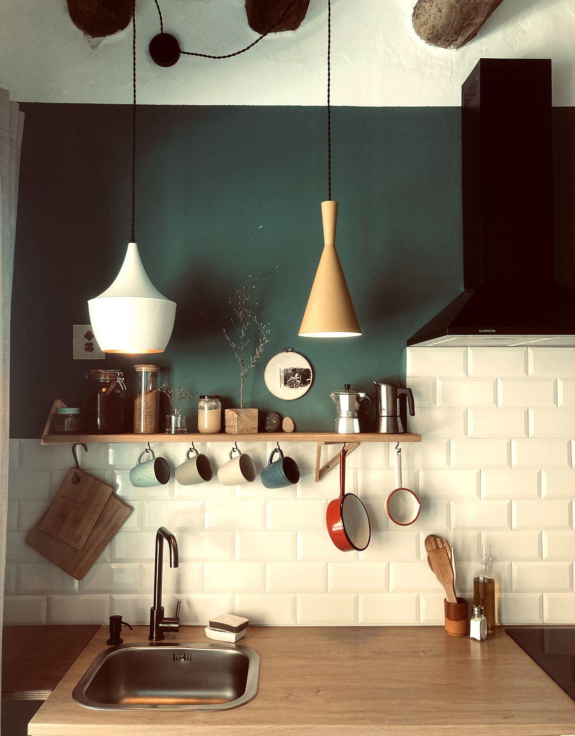 El Molino apartment showing a partial view of the open kitchen leading to the living room
