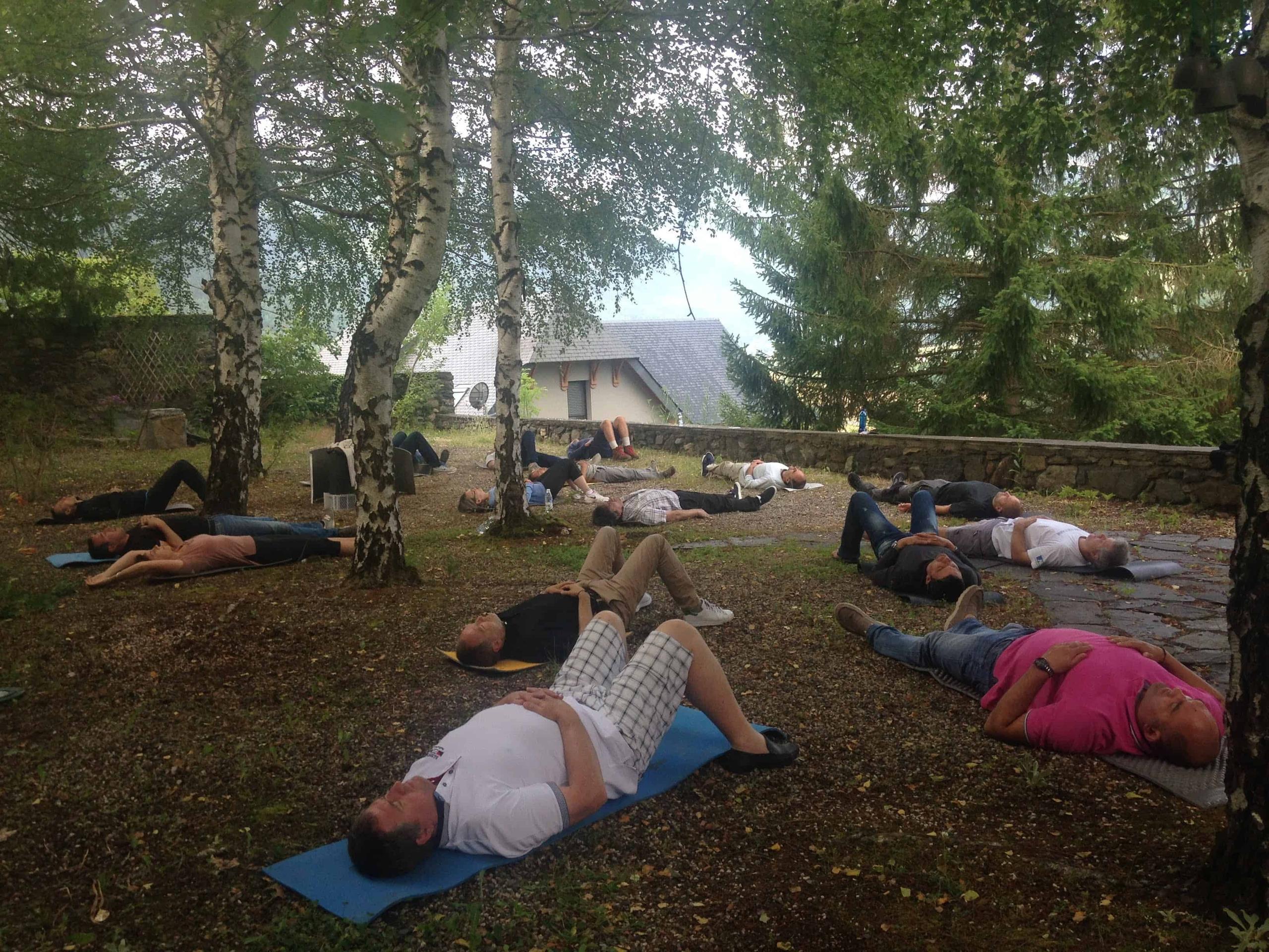 Outdoor Qi-Gong or yoga session at Pyren'Escape, conducive to activities