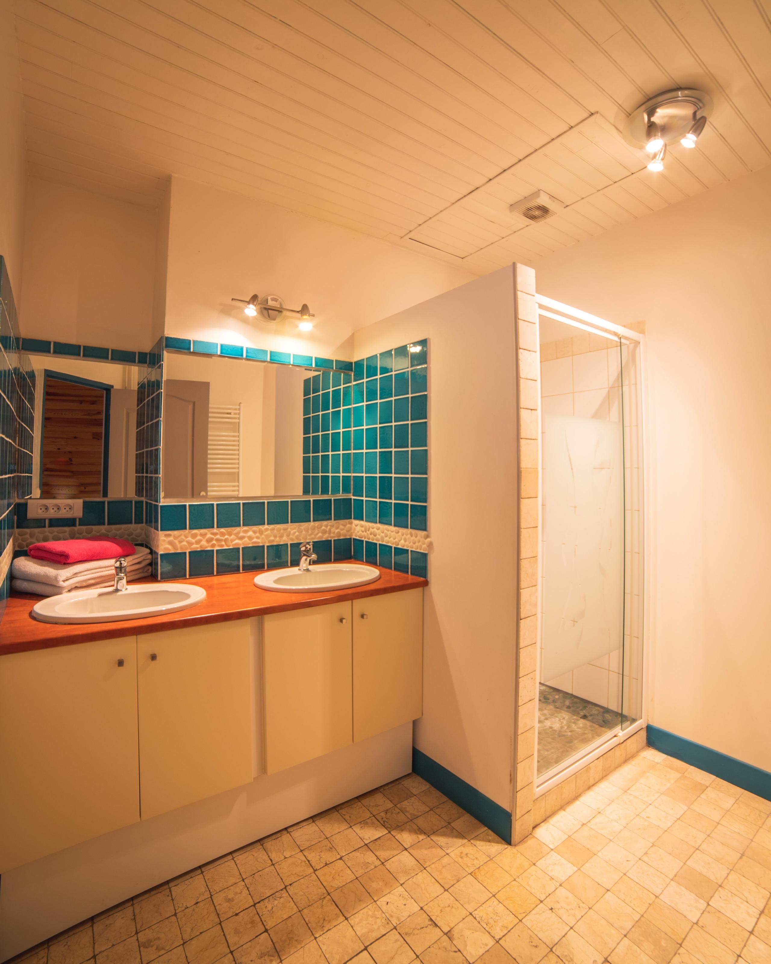 Shared bathroom with light for the Standard Rooms