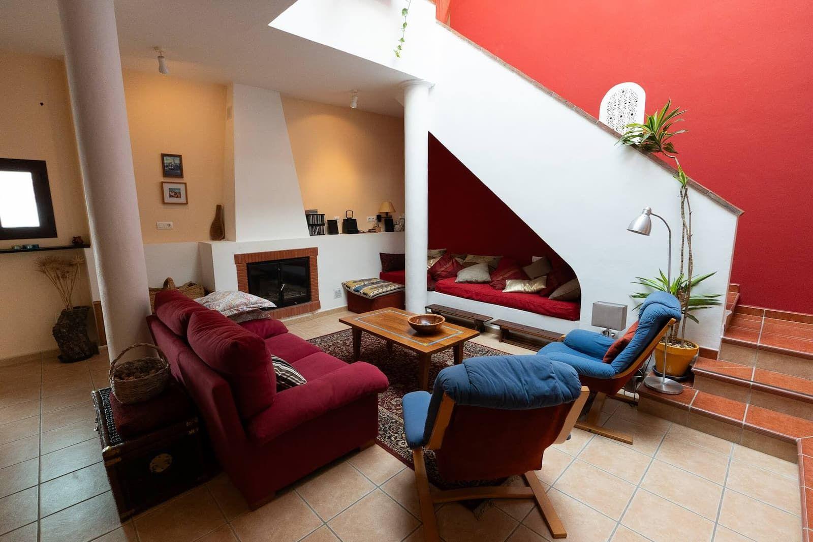 Bright and cozy living room in Rooral coliving house near Malaga, Spain, ideal for remote workers and digital nomads