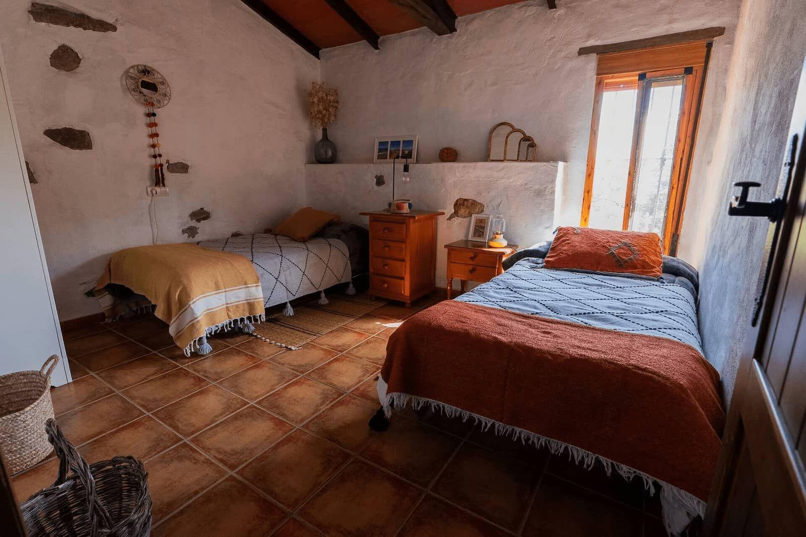 Twin shared room at Rooral coliving home, ideal for digital nomads, remote workers, and community living