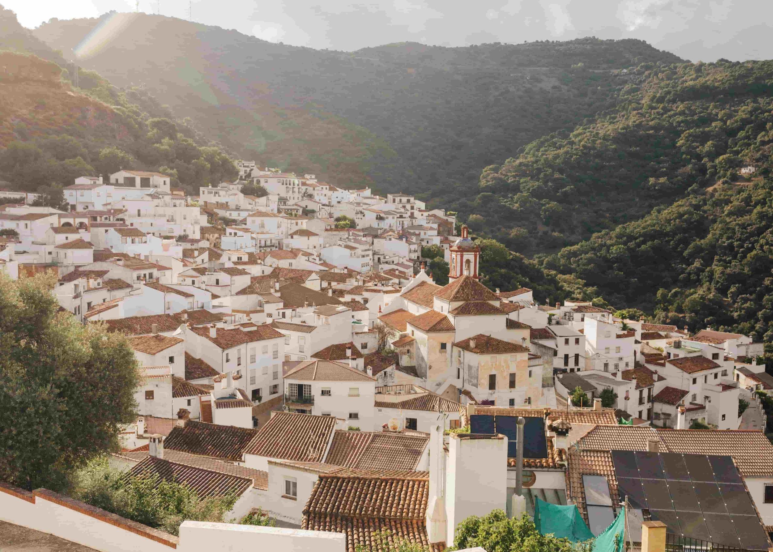 Scenic aerial view of Benarrabá village in Malaga, Andalusia — a picturesque Pueblo Blanco nestled in the mountains