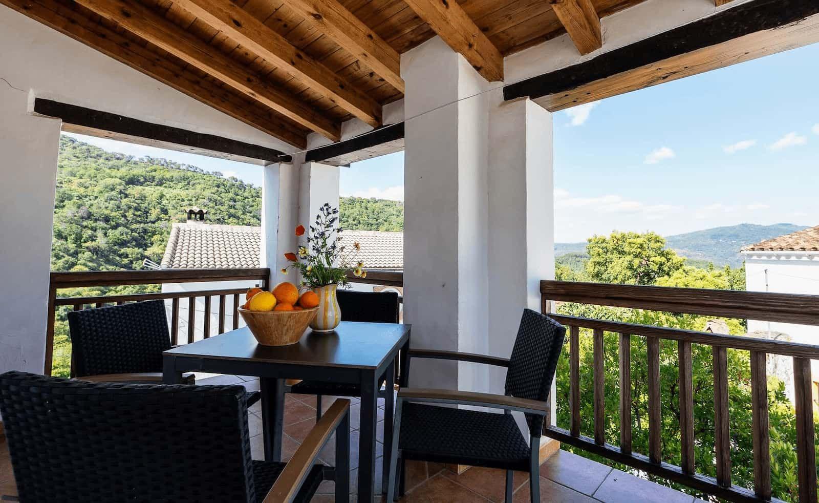 Sunny terrace of Rooral coliving home with mountain views, ideal for digital nomads, remote workers, and community living
