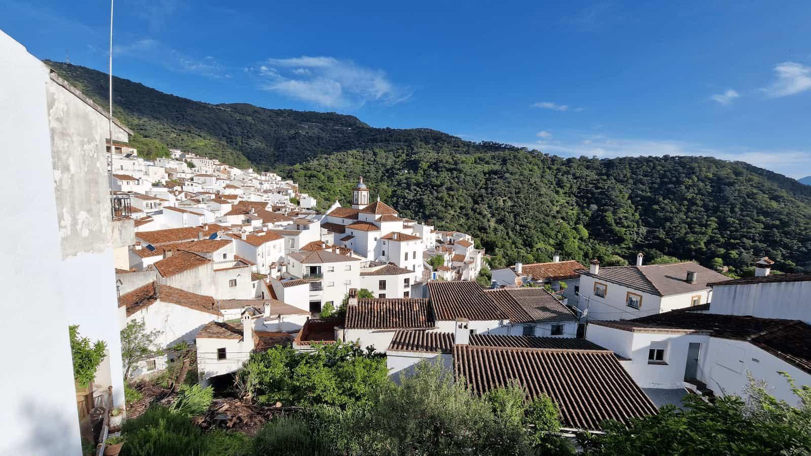 Village life in Benarrabá, showing the community and surroundings