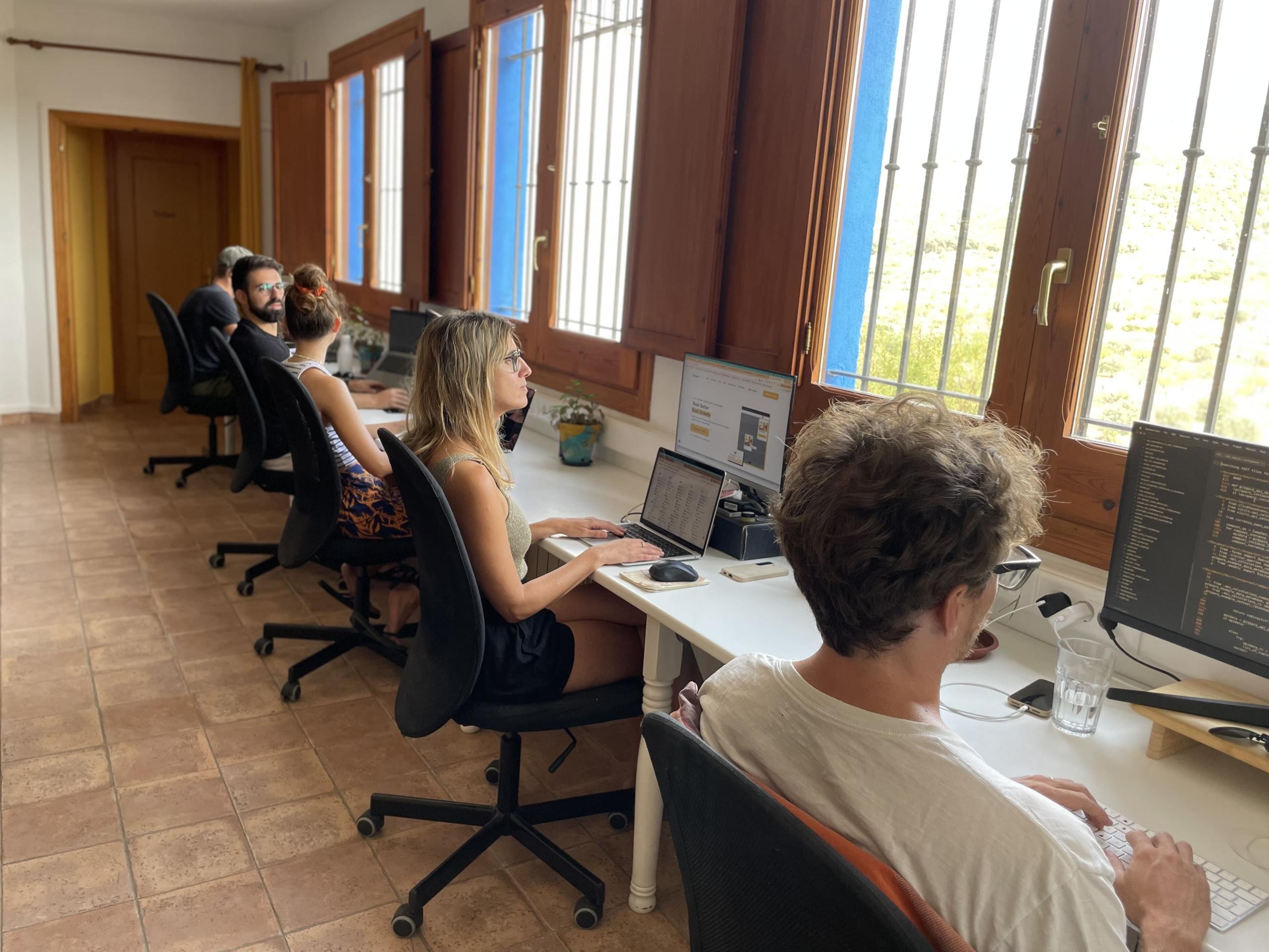 open working space with people working in ruralco