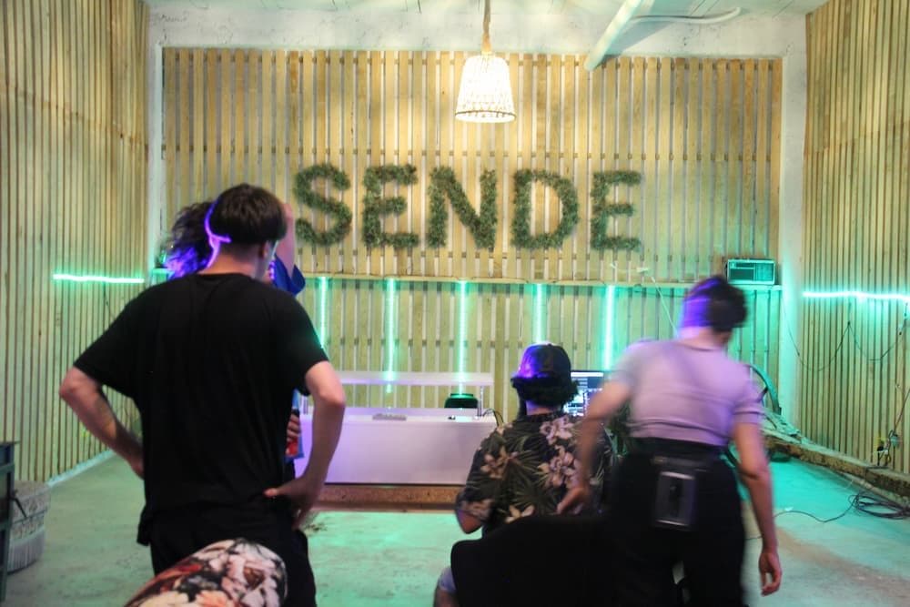 4 creative coders and artists are preparing the light show inside of a coworking space in Sende. Both coworking spaces are easily transformed to a space for events, talks or concerts.