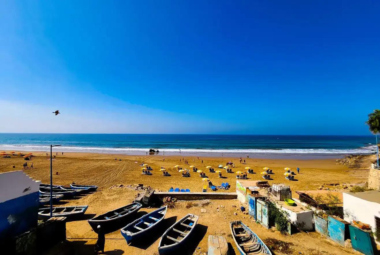 A view of the beach in Taghazout with boats