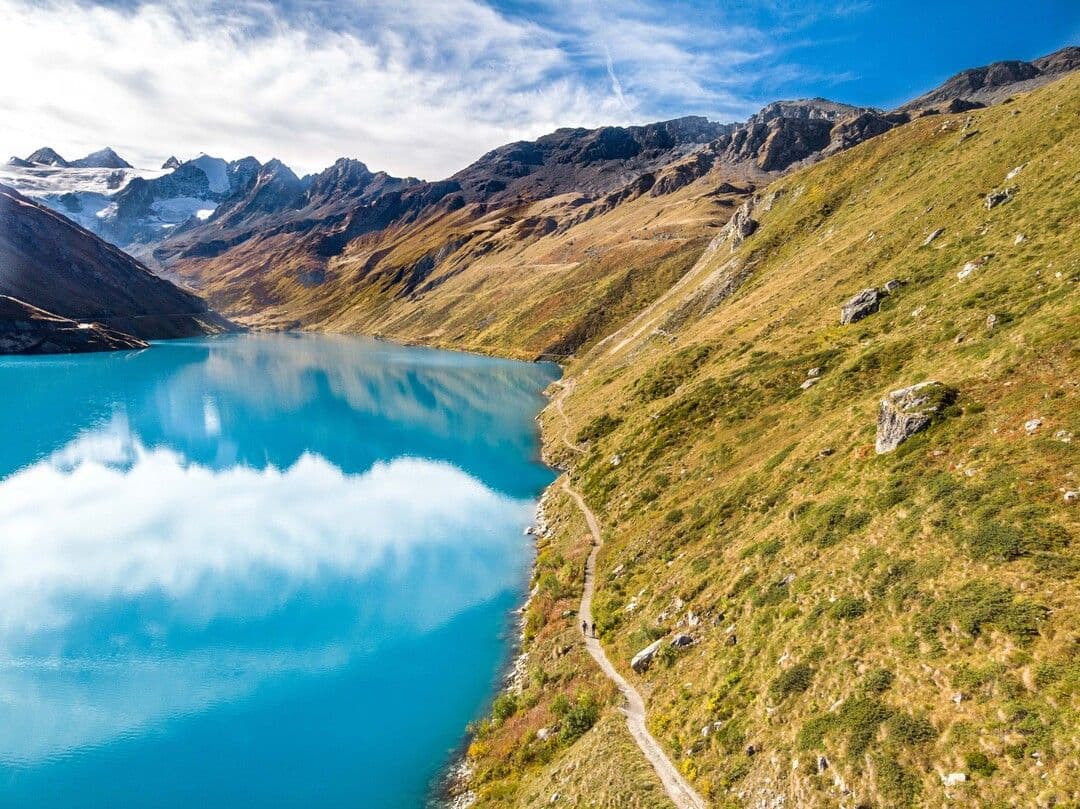 Lake and meadows in the mountains near Grimentz, ideal for hiking