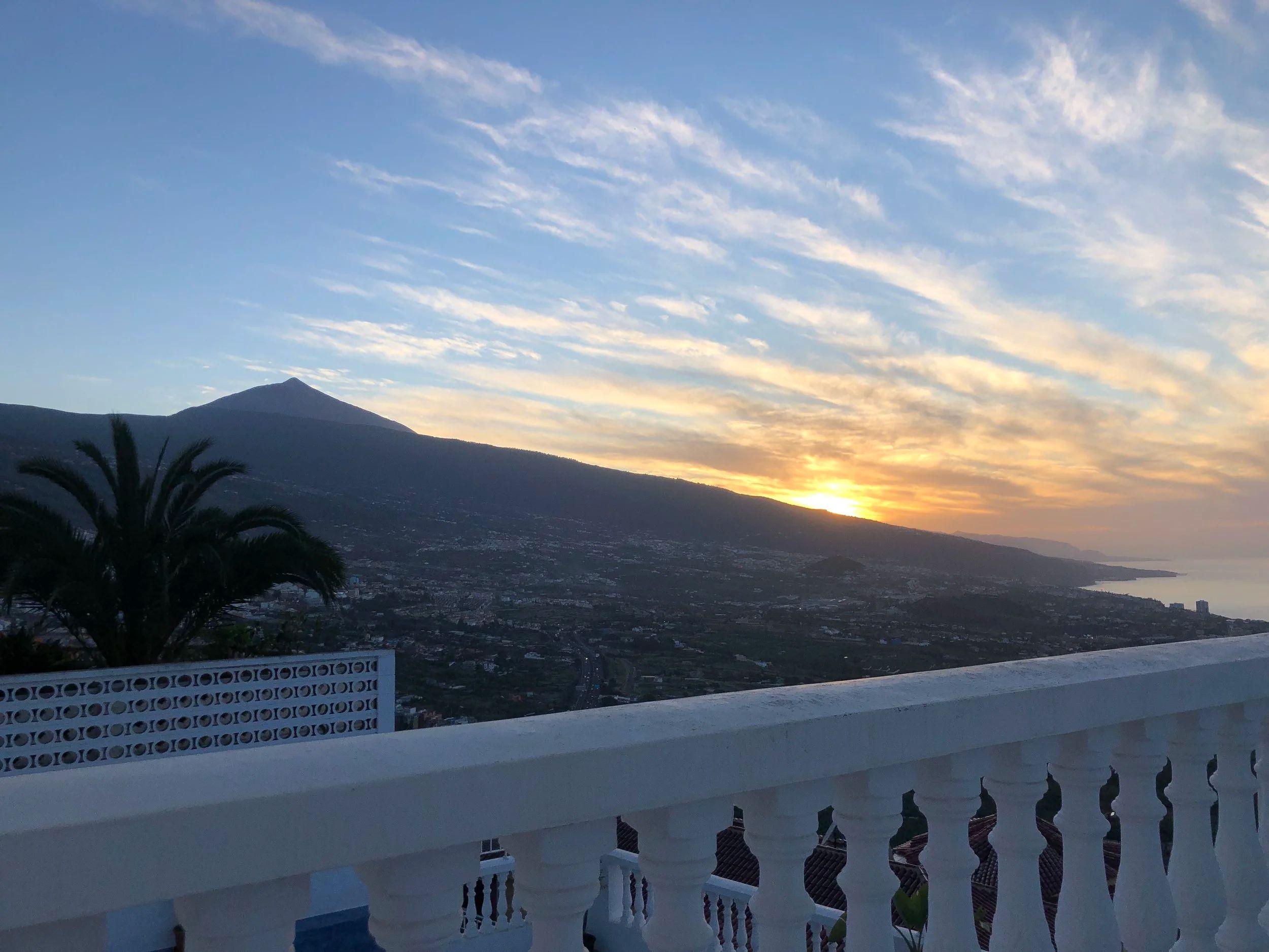 Panoramic sunset view from the terrace with Mount Teide and the valley below