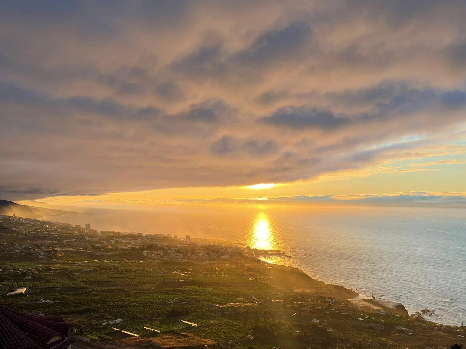 Spectacular sunset view over the coast and sea of Tenerife from the coliving