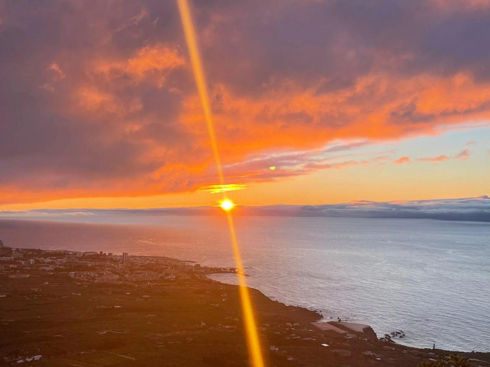 Spectacular sunset view over the coast of Tenerife from the coliving terrace