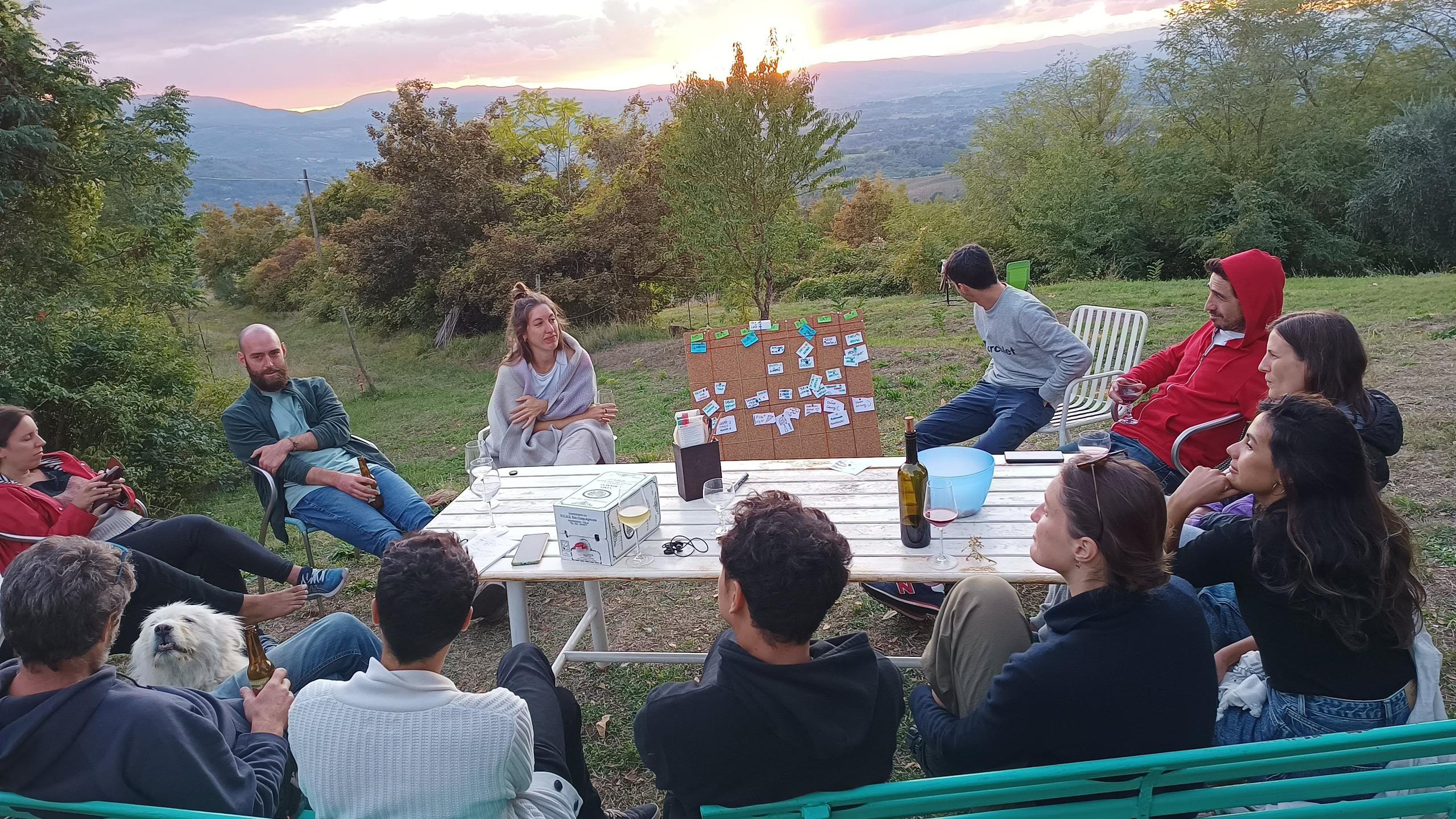 Community meeting with a view at the coliving coworking in Tuscany