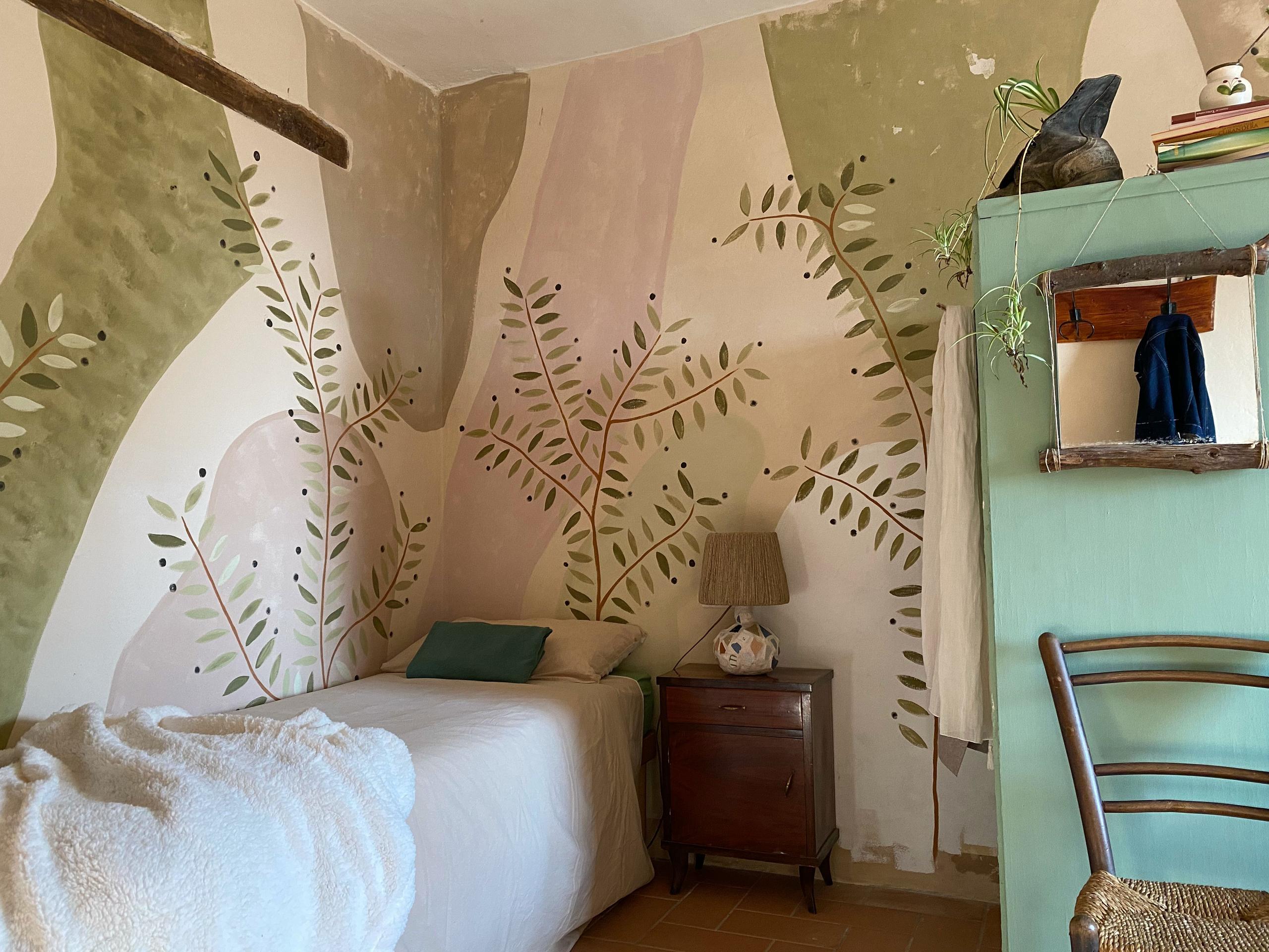 Interior of Room Radici showing the Etruscan-inspired decoration with contemporary touch