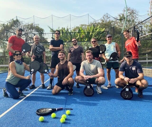 Coliving members at padel court in Chiang Mai