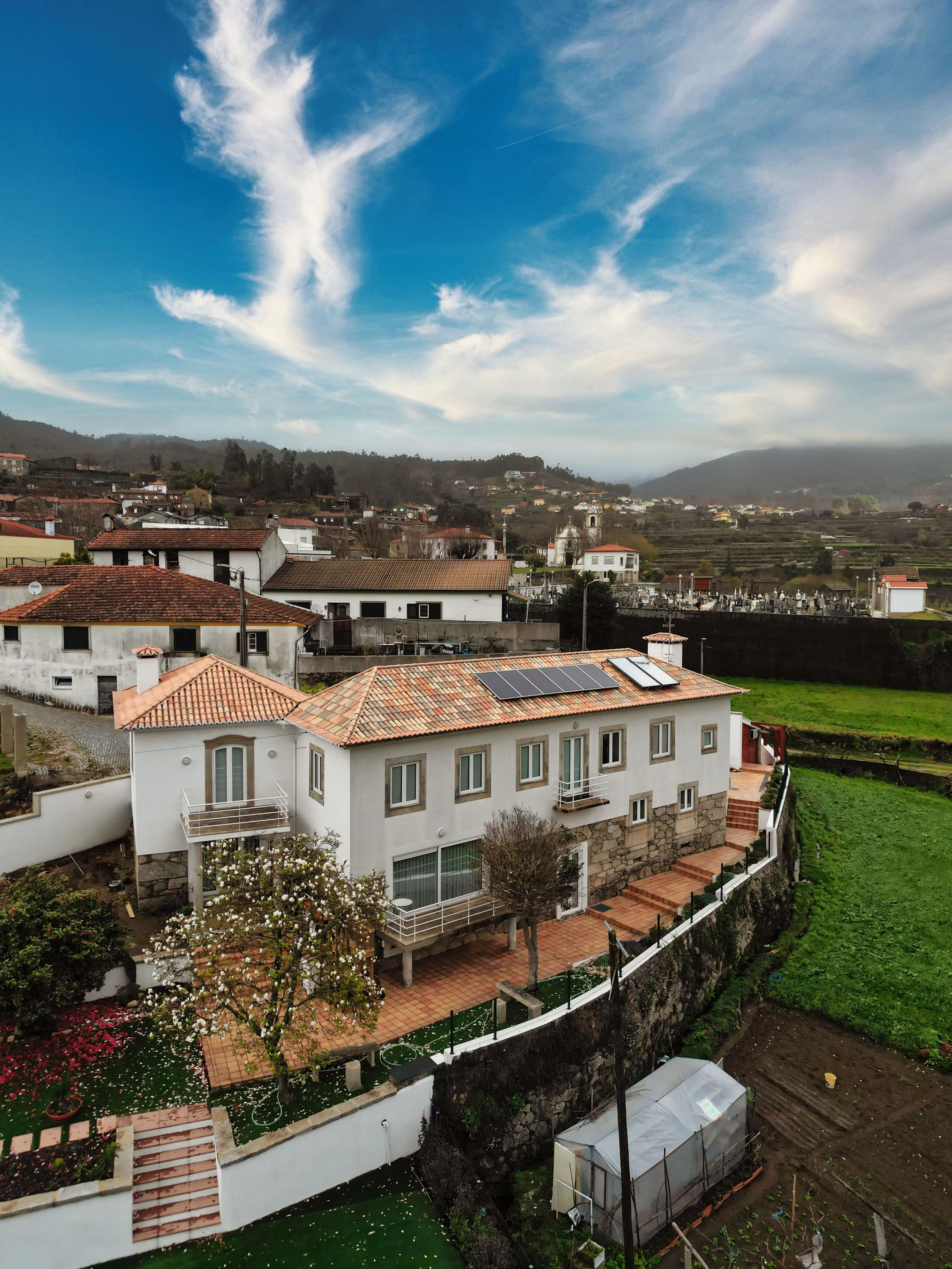Drone aerial shot of the Coliving The VALLEY building and surrounding countryside in Rôge, Vale de Cambra, Portugal