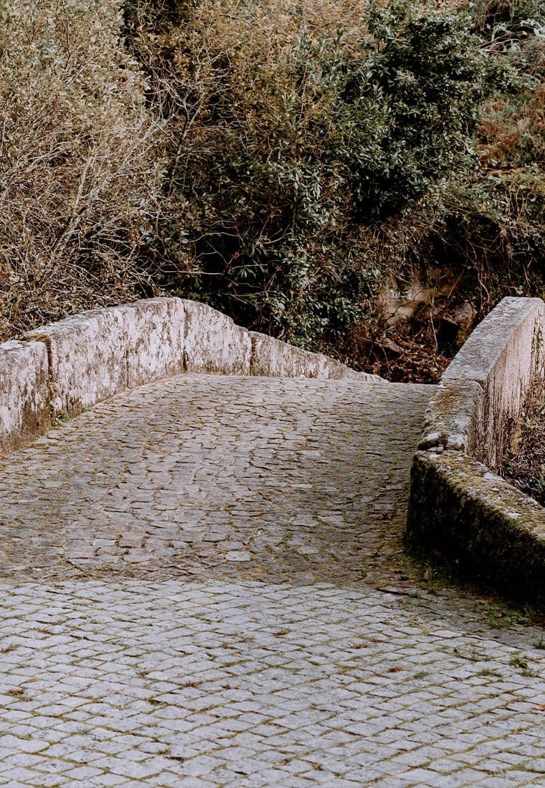 The Castelo do Mau Vizinho Bridge spanning the Caima River between Rôge and Berbedã