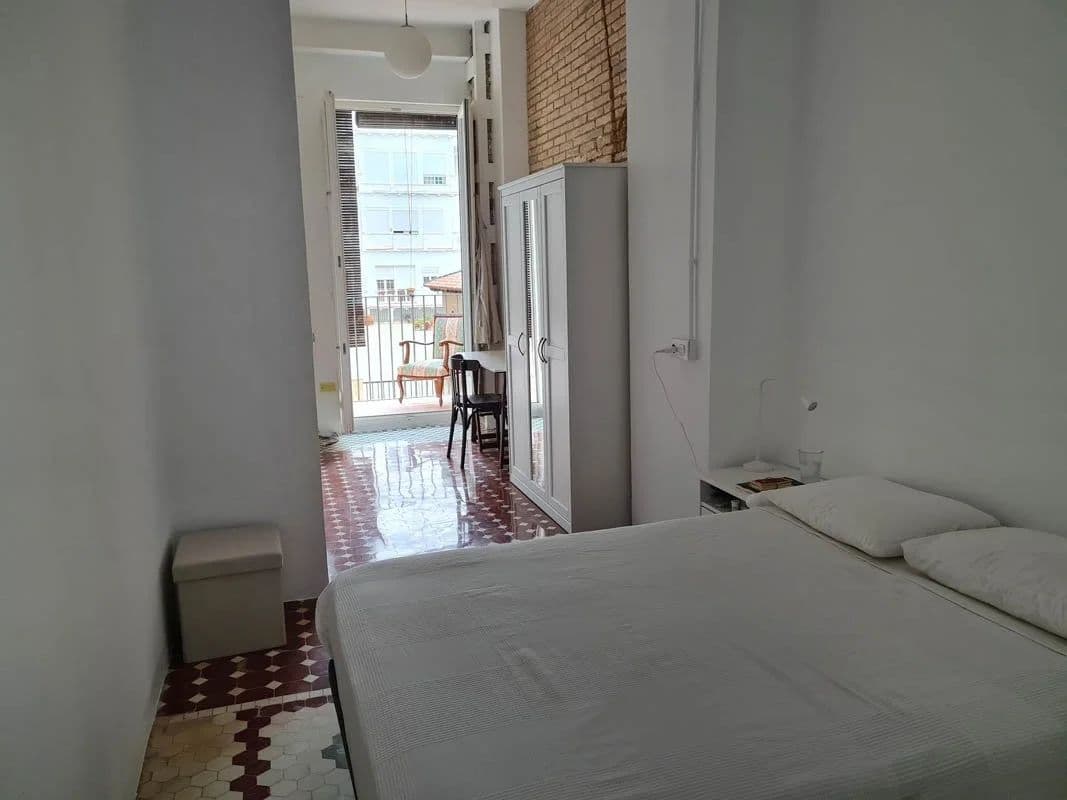 Bedroom with a private terrace in Vivarium coliving