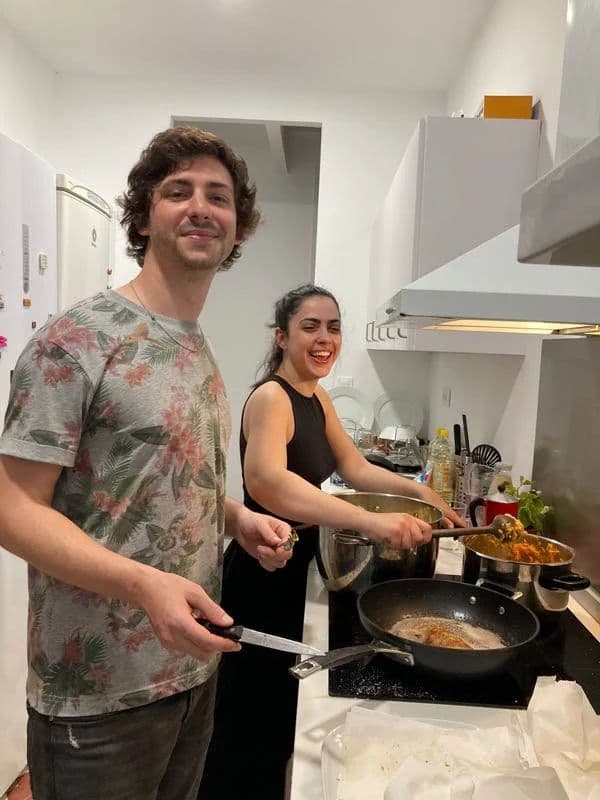Colivers preparing for family dinner in Vivarium Coliving