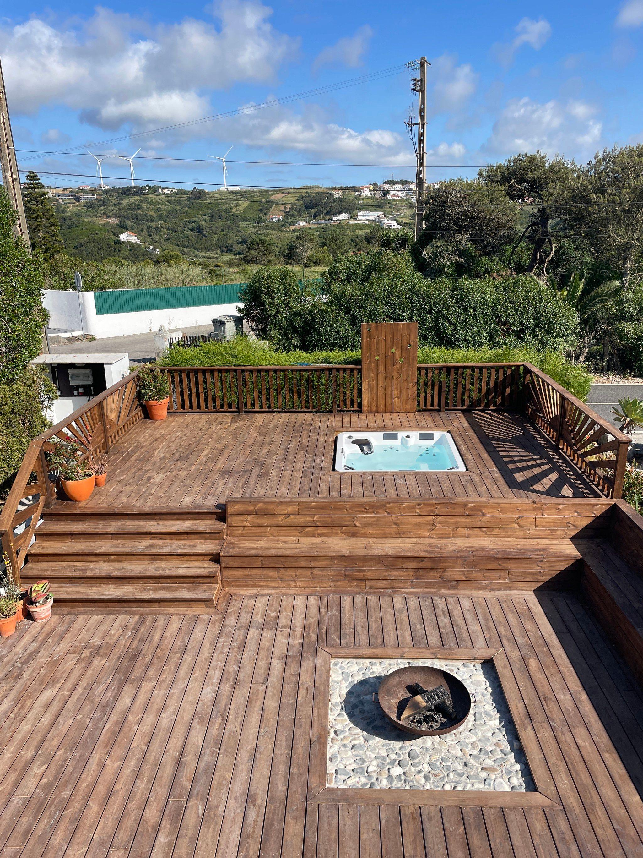 A deck to enjoy the sun - Our tiered deck is perfect for day and night: full sun, lounge seats, space for yoga, a fire pit to gather around, and a jacuzzi to lounge in