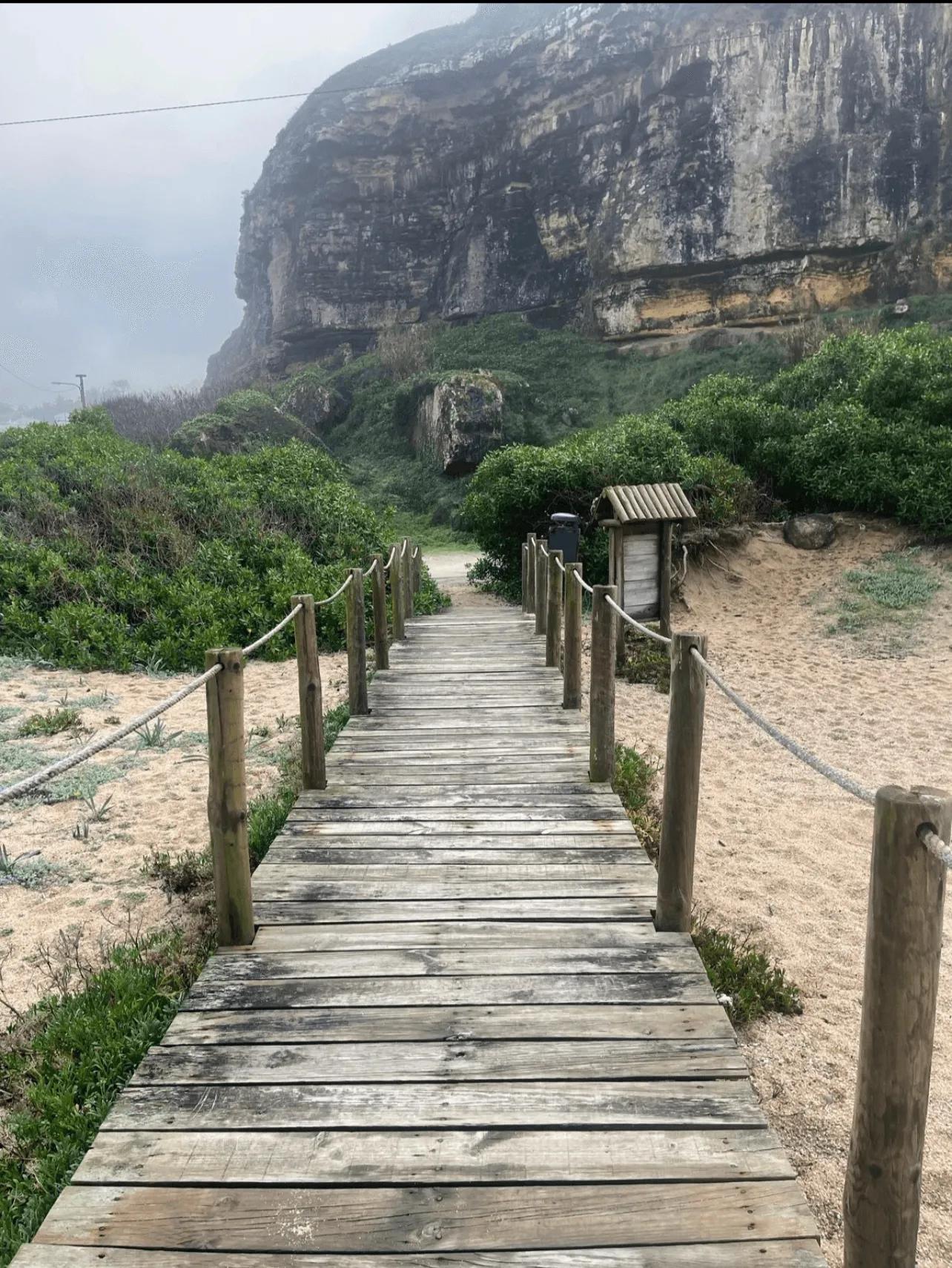 View of boardwalk at Ericeira beach near Wild Souls Coliving in Portugal